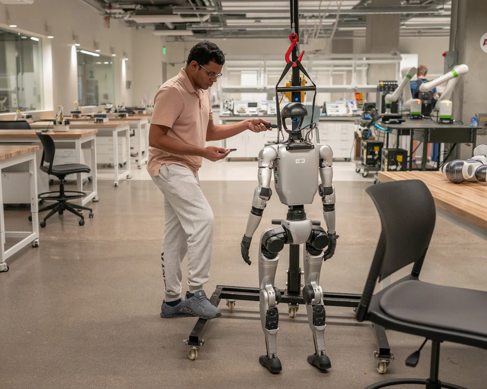 Working with a robot at ASU’s School of Manufacturing Systems and Networks