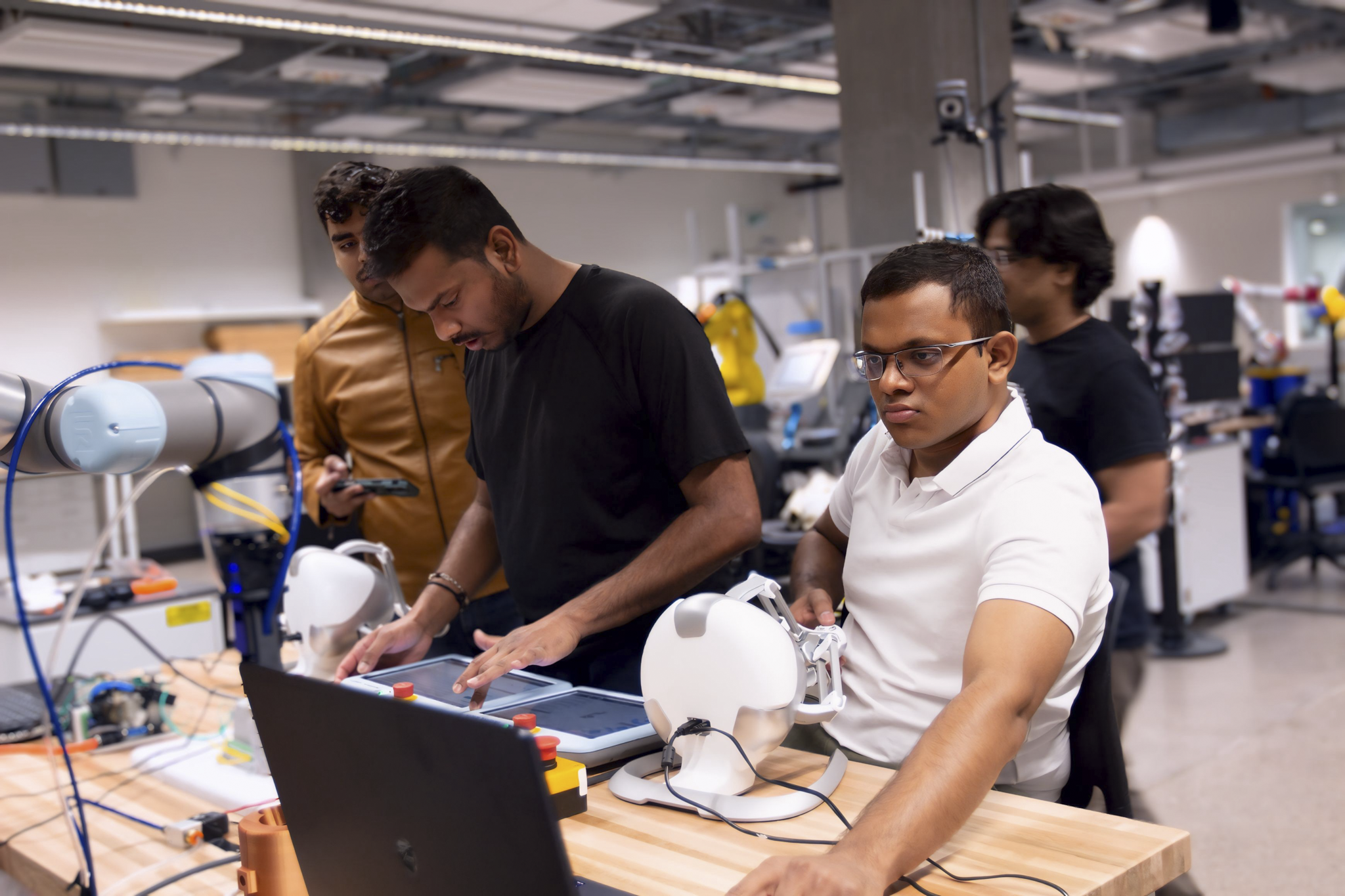 Working with a team on collaborative robot hardware during the LANL Hackathon